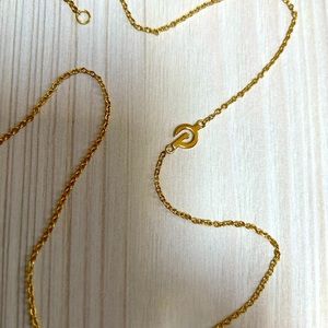 Peloton Gold Logo Necklace by J. LUU w/ pink storage pouch